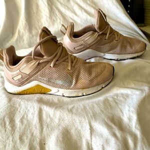 Rose pink and silver womens size 8 Nike running shoes